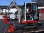 Nov pomocnk TAKEUCHI TB 216